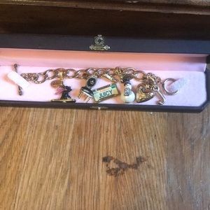 Juicy contour charm bracelet with many rare charms